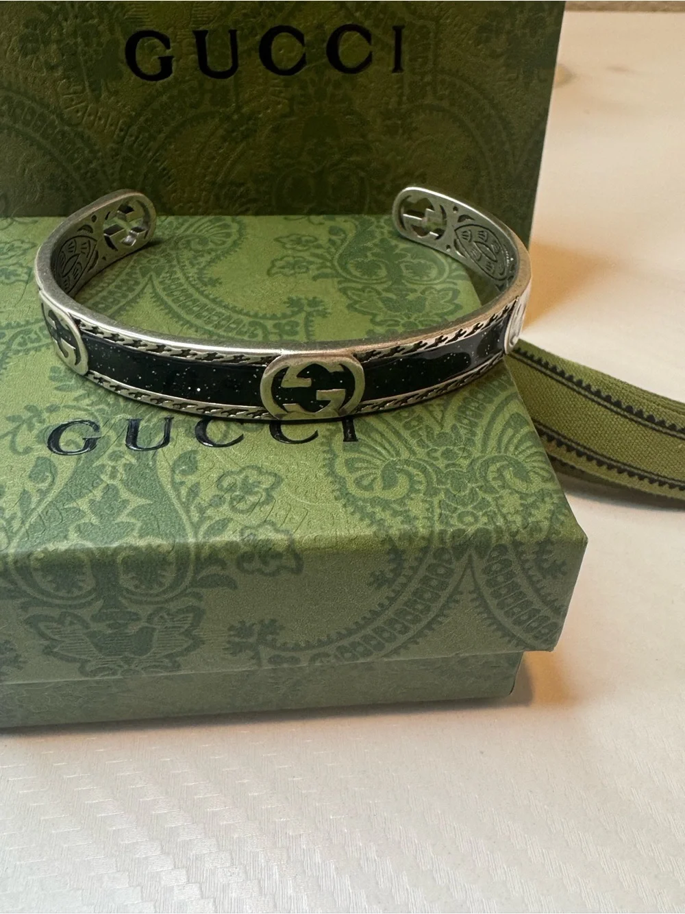 Gucci Silver-Tone Cuff with Black Inlay and Interlocking G Detail